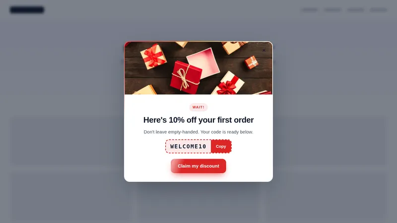 Exit-intent discount popup with a copyable coupon code on a sample website